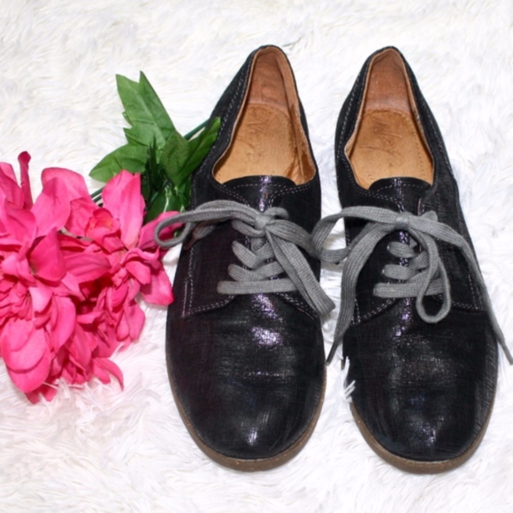 Naya shiny metallic black leather laced loafers
